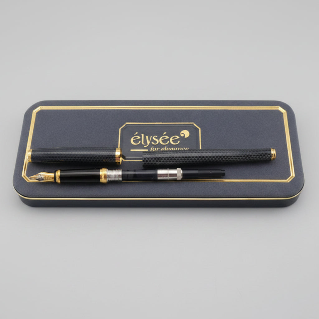 A grey and gold Elysée Fountain Pen set with its original presentation box.