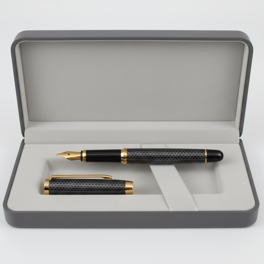 A grey and gold fountain pen with a honeycomb-patterned grip, resting on a gray presentation box.